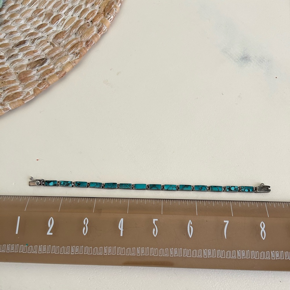 Vintage turquoise inlaid sterling silver bracelet. Bought in SantaFe for $250.